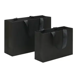 Toptan ucuz fiyat ünlü marka hediye özel baskılı kağıt alışveriş torbası özel Logo ile Kraft kağıt torba özel