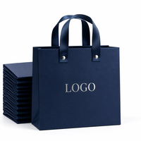 Sacs de shopping de luxe écologiques personnalisés avec poignées en papier blanc laminé