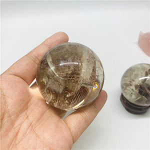 Pierres de guérison en cristal naturel en gros, petites sphères de quartz fumé sculptées à la main pour la décoration de la maison - Product Image 1