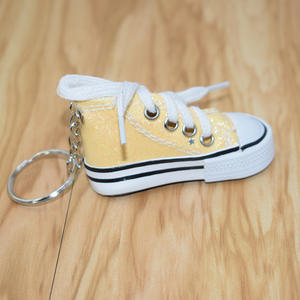 yellow converse keychain