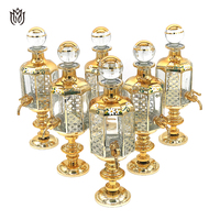 Fabricant arabe 450 ml décanteur affichage bouchon en verre Attar Oud bouteille en verre d'huile avec robinet