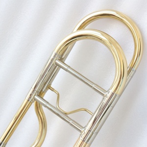 Trombone ténor professionnel <span class=keywords><strong>de</strong></span> haute qualité Bb/F <span class=keywords><strong>en</strong></span> laiton laqué clair avec glissière manuelle et pistons <span class=keywords><strong>en</strong></span> acier inoxydable OEM - Product Image 3