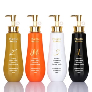 Envase de Lujo Personalizado con Logotipo, Envase de Plástico Cilíndrico Negro de <span class=keywords><strong>500</strong></span> ml y 750 ml para Lociones, Champú, con Bomba Dorada - Product Image 1