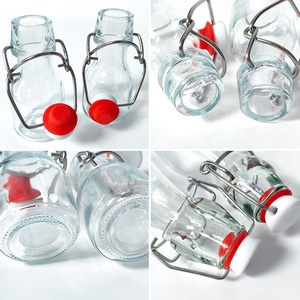 Envase de Vidrio Reutilizable con Tapa Abatible y Tapón de Goma Hermético para Almacenamiento de Té Frío, Aceite de Oliva, Vinagre y Condimentos de Cocina - Product Image 3