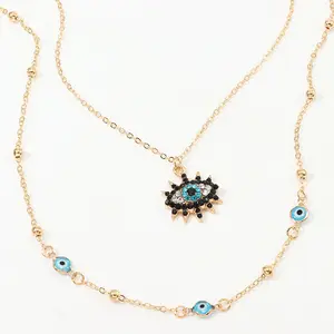 Vendite calde Fatima Gold Women Jewelry Chain Statement accessorio lungo collana con ciondolo a mano con zirconi cubici blu malocchio