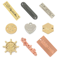 Étiquette de vêtements personnalisée en gros d'usine accessoires de personnalisation chemise graver le logo de la marque étiquettes en métal pour vêtements