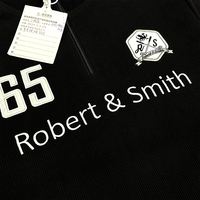 Sweat-shirt noir personnalisé en velours côtelé pour l'hiver, avec fermeture éclair quart de tour et motif de lettres brodé