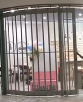 Porte coulissante automatique pliante en gros, matériau transparent, porte de magasin, porte pliante en polycarbonate