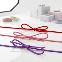 En gros, nœuds en cordon élastique, nœuds en ficelle élastique, nœuds en ruban extensible pour la décoration de boîtes à pâtisserie et les attaches