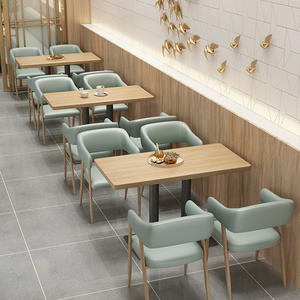 Ensemble moderne et élégant de meubles de café avec les chaises tapissées bleu-vert clair et les tables en bois - Product Image 4