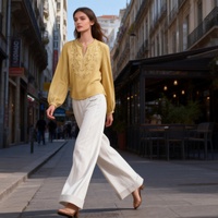 Chemisier brodé à col en V pour femme, coupe ample décontractée, manches longues et poignets bouffants, idéal printemps-été