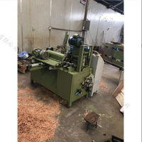 Machine de production de poignée de hache, tête de marteau automatique, machine à manche en bois, machine à manche croisé
