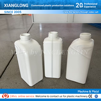 Machine de moulage par extrusion semi-automatique pour la fabrication de bouteilles de détergent en HDPE de 1L et 2L