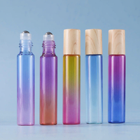 Flacon en verre dégradé/transparent de 5 ml et 10 ml avec bille en acier et couvercle noir/à motif bois pour l'emballage d'huiles essentielles/parfums