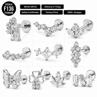Vente en gros de bijoux de piercing pour femmes : Clous labret à dos plat en titane F136 plaqué or, stériles, avec zircon, motifs papillon, trèfle, lotus