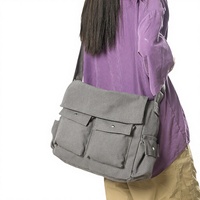 Sac bandoulière unisexe en toile grande capacité style postier, idéal pour étudiants, avec fermeture éclair et poches artistiques pour les loisirs