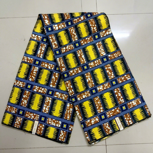 Yellow Brown Geometric Ankara Wax Print Fabric with Modern Grid Pattern for African Dresses and Fashion Wear - Product Image 1