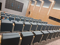 Fauteuils pliables au design moderne pour auditoires Salle de conférence Chaises auditorium avec table d'écriture