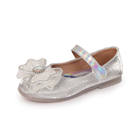 Vente en gros de nouvelles chaussures mignonnes de haute qualité pour filles de 12 ans baskets plates de princesse en or rose avec nœud de dessin animé produits populaires aux États-Unis