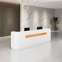 Dongguan Table de réception pour chambre d'hôtel Table de réception de vente au détail à LED Table de réception géométrique en forme de L Bureau de réception blanc