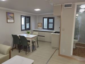 OEM personalizado precio razonable al por mayor de 20 pies 40 pies de acero prefabricado modular expandible casas de contenedores con ruedas - Product Image 3