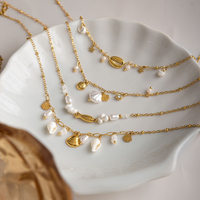 Collier J&D Jewelry en acier inoxydable plaqué or 18 carats avec coquillage, étoile de mer, perle et cristal, bijoux nautiques pour femmes