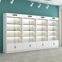 Kainice Maßgefertigter LED-Beleuchteter Metall-Wandschrank Kosmetik-Präsentationsschrank Mehrstöckige Make-up-Regale Abwaschbar Hochwertig