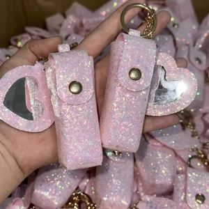กล่องใส่ลิปสติก PU แบบใหม่ ประกายวิบวับ พร้อมกระจก พกพาสะดวก ใช้เป็นกระเป๋าใส่เหรียญ กระเป๋าเครื่องสำอางขนาดเล็ก พร้อมพวงกุญแจ ของขวัญแฟชั่น ขายส่ง - Product Image 1