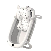 Ensemble de bain pour bébé 12-en-1 pratique en plastique avec support de séchage, thermomètre, coussin flottant et bonnet de douche pour 0-12 mois