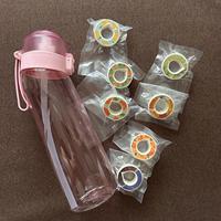 Bouteille d'eau Tritan de 22 oz aux saveurs de fruits avec un diffuseur d'air parfumé, adaptée aux sports de plein air