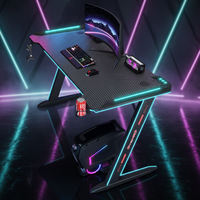Bureau de jeu avec lumières LED RVB, grand bureau PC de jeu en forme de Z avec table de bureau de jeu d'ordinateur de bureau en fibre de carbone pour joueur