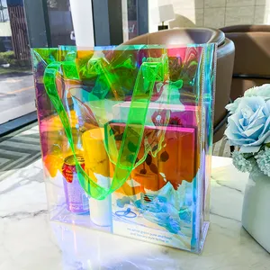 Vente en gros sac cadeau promotionnel holographique irisé couleur personnalisée mode Laser transparent gelée fourre-tout sac à provisions en PVC