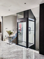 Ascenseur de villa accessible avec cabine spacieuse pour fauteuils roulants, idéal pour maisons privées et personnes à mobilité réduite
