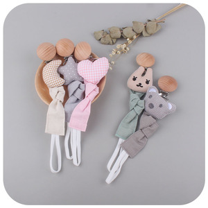 Nouvelle sucette élégante en bois de hêtre pour bébé avec mamelon en Silicone sûr étoile Animal coton lin ruban motif de dessin animé pour les nouveau-nés - Product Image 3