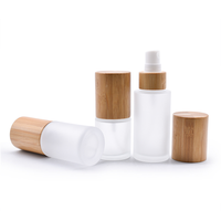Botol Losion kaca tutup bambu kualitas tinggi 30ml 2oz botol semprot buram bening minyak esensial