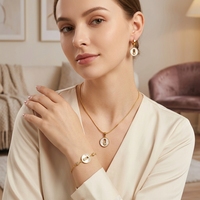 Ensemble de bijoux Fatingna en acier inoxydable avec accessoires mignons en forme de fleur et de nœud, serti de zircon plaqué or, unique et élégant