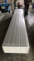 Panneau de porte de garage moderne en polymère, fourni directement par l'usine, avec surface finie et isolé, pour entrepôts et hôtels, vente en gros