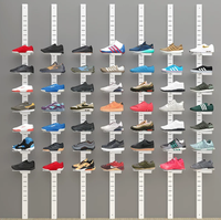 Étagère à chaussures murale en métal robuste et moderne avec présentoir Slatwall, 5 à 10 niveaux, pour boutiques de chaussures
