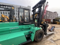 Chariot élévateur diesel Mitsubishi FD300 d'occasion en stock, capacité de levage de 3 tonnes, moteur d'origine en parfait état de marche.