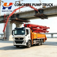 Camion pompe à béton HOWO TX 6X4 d'occasion, 10 pneus, flèche hydraulique en excellent état pour travaux de coulage quotidiens sur chantier