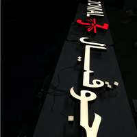 Enseignes lumineuses en acier inoxydable pour le bâtiment de siège de YIJIAO, lettres en relief LED pour l'architecture