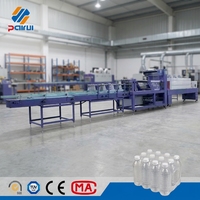 Machine d'emballage sous film rétractable à grande vitesse de type linéaire pour boissons gazeuses entièrement automatique avec contrôle PLC