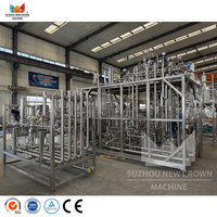 Machine de remplissage et de stérilisation entièrement automatique pour yaourt, lait et boissons laitières, 24000-48000 BPH, avec pièces de rechange incluses