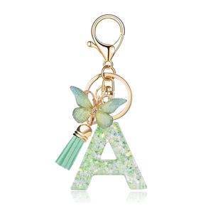 CHENXI Porte-clés personnalisé en résine avec lettre A-Z, breloque pour sac à dos, pendentif de voiture, pompon pour femme - Product Image 1