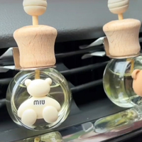 Vente en gros de luxe haute qualité vide 5Ml 6Ml 8Ml 10Ml dessin animé photos voiture parfum verre diffuseur alliage quatre feuilles flacon