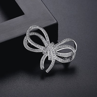 Broche en forme d'arc en zircon CZ, vente chaude, zircon cubique glacé, broche en forme d'arc, bijoux pour femmes