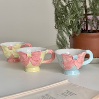 Tasse à café et thé en céramique en forme de cœur, style coréen Ins, mignonne, moderne, blanche, avec nœud noir Hepburn, écologique, 350 ml, avec soucoupe pour fête
