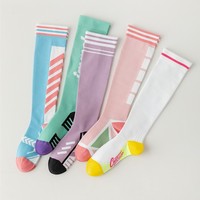 Chaussettes longues en coton décontractées pour jeunes femmes, avec revers et bas évasés, effet duveteux