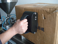 Machine de codage manuelle à rouleau, corps en acier et poignée ergonomique, fonction d'économie d'encre pour le codage des sacs en plastique, faible MOQ