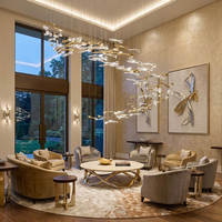 Lustre en cristal de luxe, style artistique nordique, pour hall d'hôtel, foyer, lampe LED en métal et cristal design, lampe poisson volant